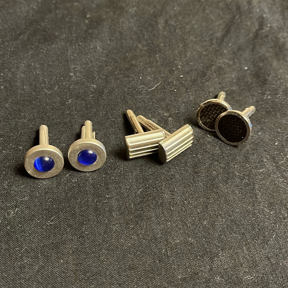 3 PC LOT cuff links, one blue, one black, and one silver finish.